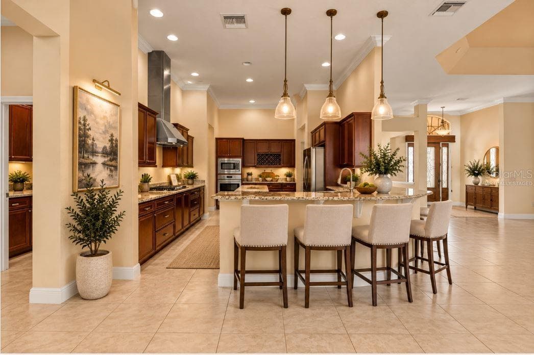 Virtually staged kitchen counter. - 1126 MIONA SHORES DR, THE VILLAGES