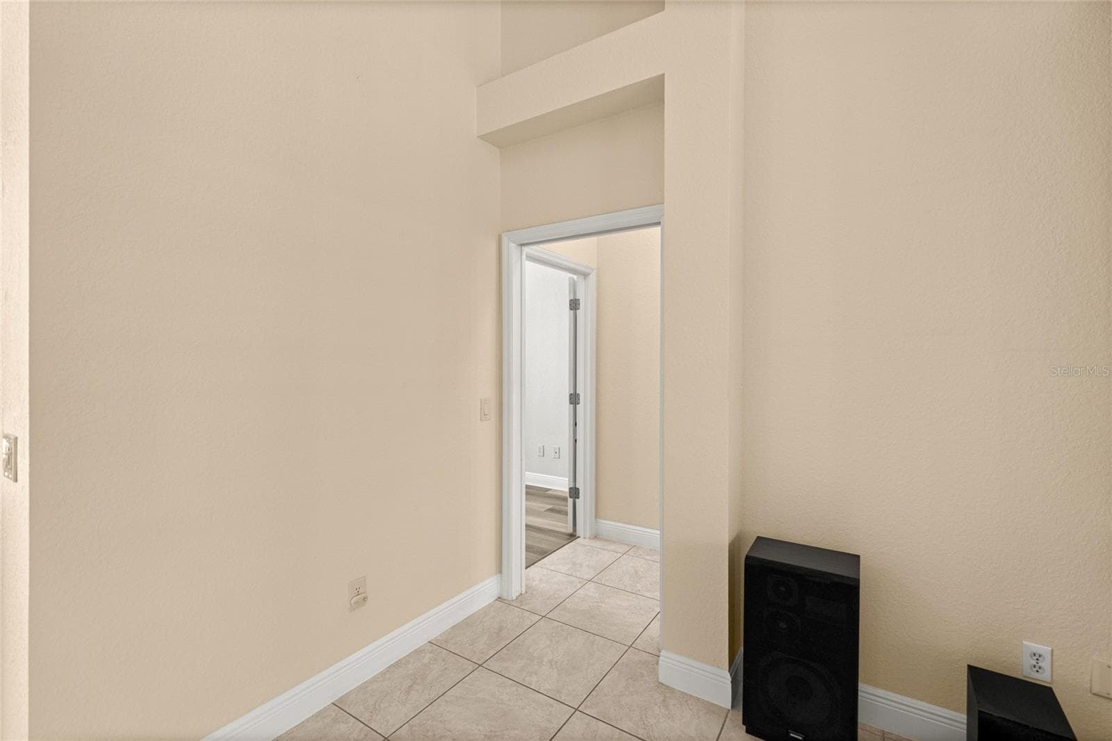 Hallway Leading to Guest Bedrooms and Home Office. - 1126 MIONA SHORES DR, THE VILLAGES
