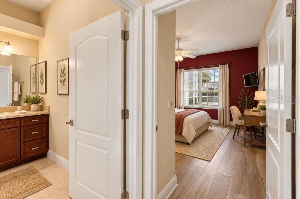 Virtually staged Hallway to guest bathroom/bedroom/office. - 1126 MIONA SHORES DR, THE VILLAGES