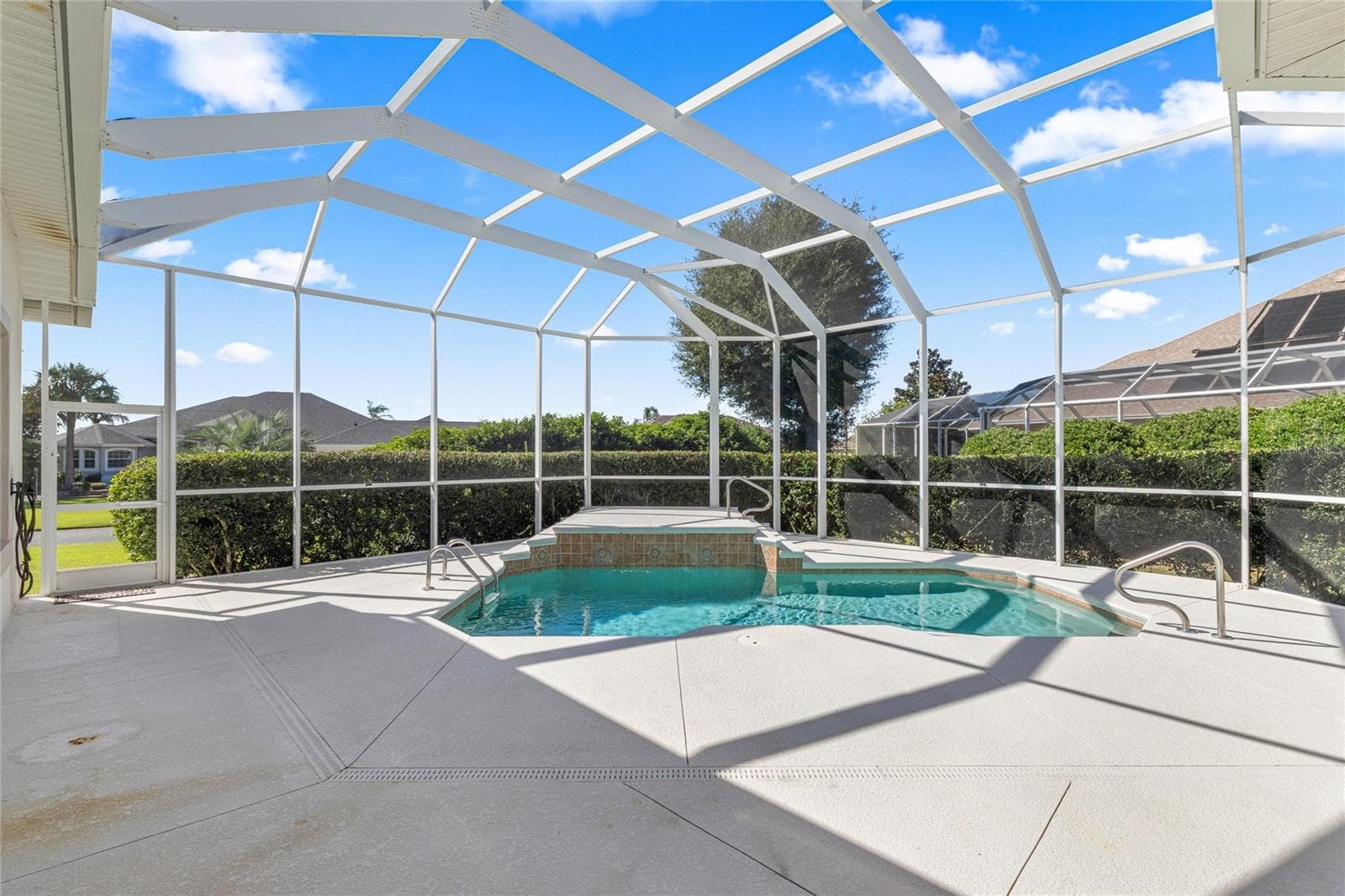 Salt water pool with Miona shore lake view. - 1126 MIONA SHORES DR, THE VILLAGES