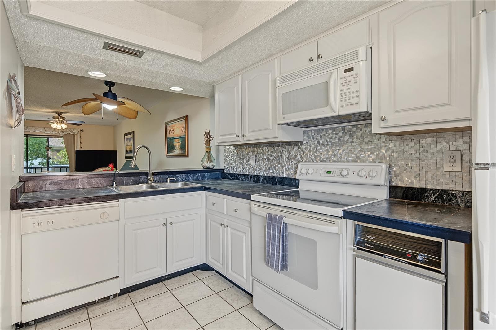 Condominium at 110 LAKESIDE CT #110, OLDSMAR, photo 5 of 34