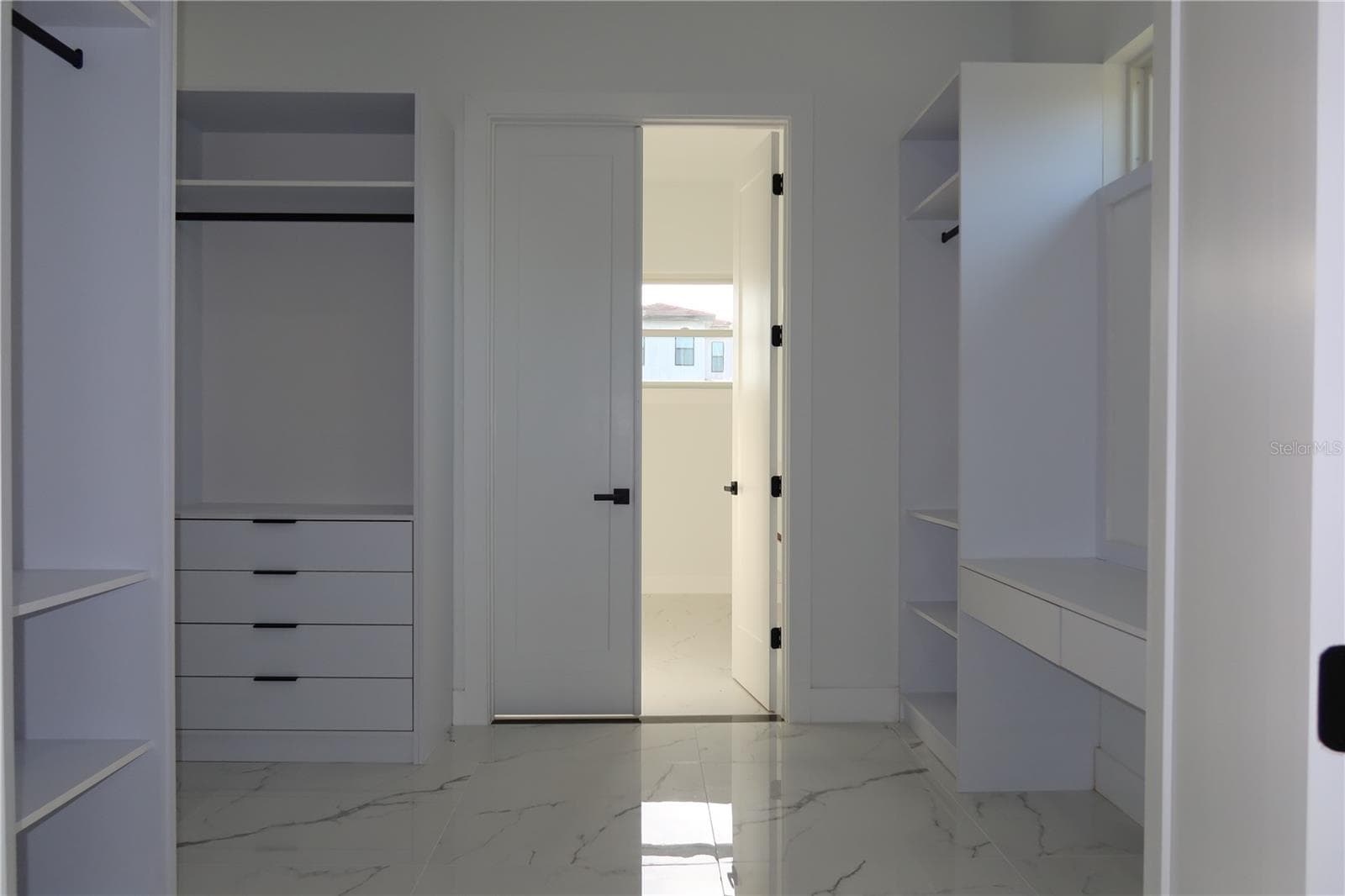 Walk in closet - primary bedroom - 151 BLAZING STAR AVE, LAKE ALFRED