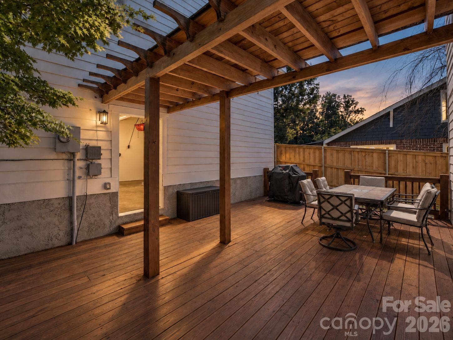 Twilight rendering of grill area where entertaining is easy, right off the kitchen - 92 Rumbough Place, Asheville
