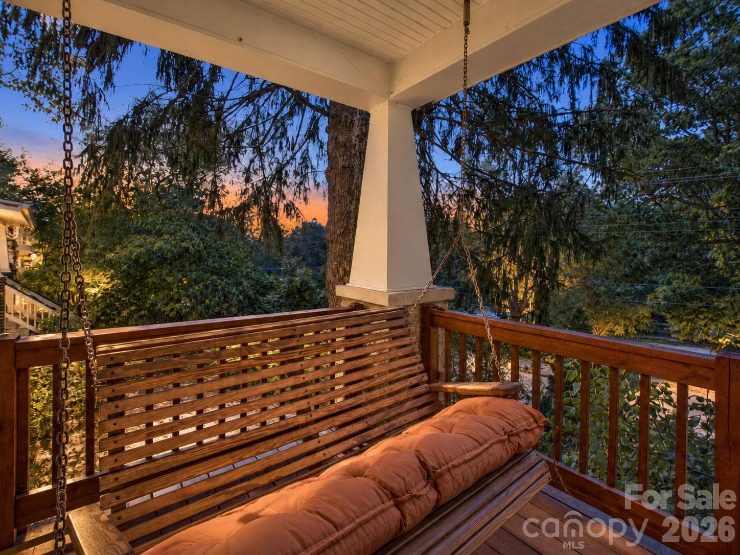 Twilight rendering of front porch swing area for sipping and chatting with excellent park views - 92 Rumbough Place, Asheville