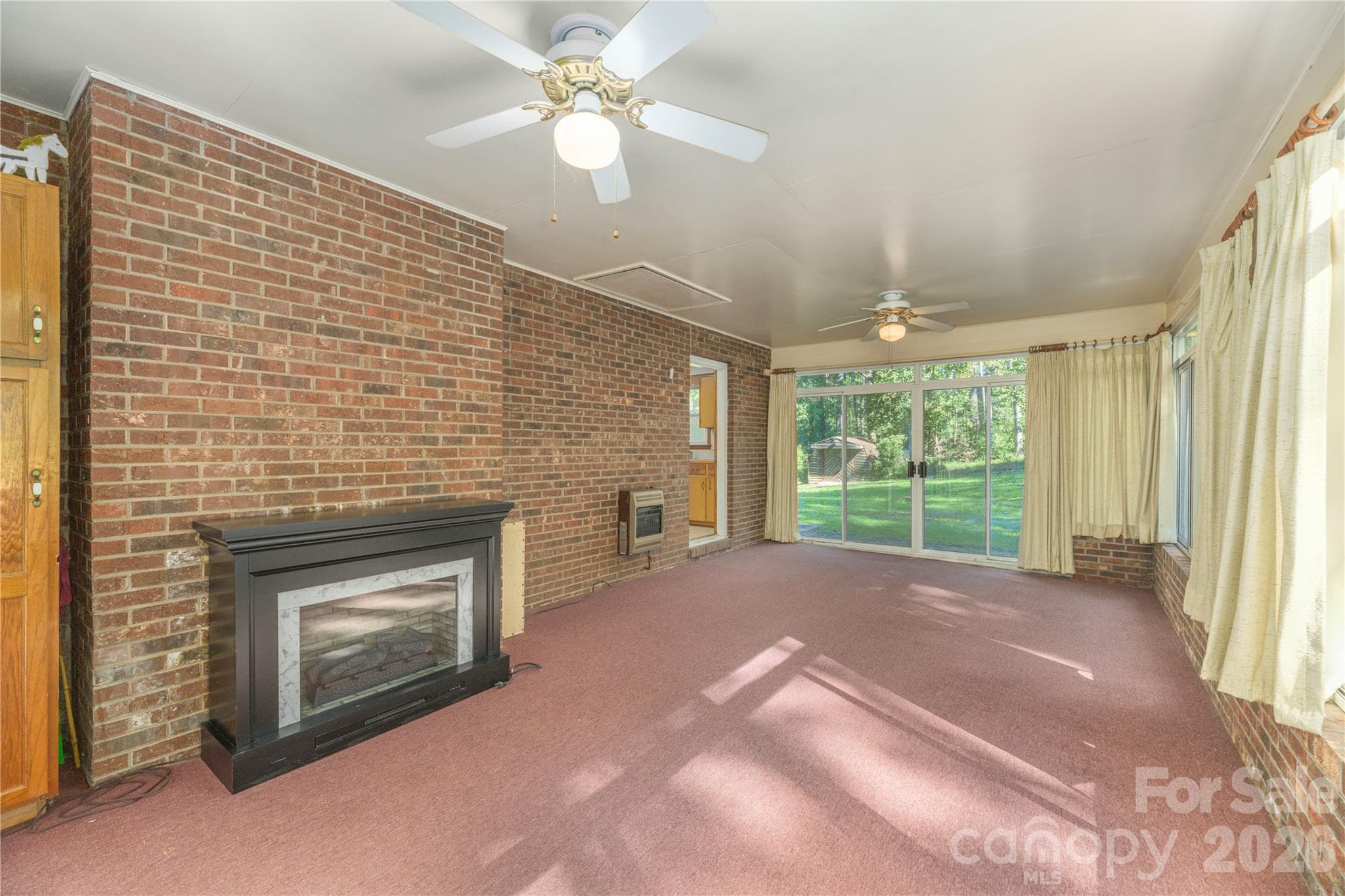 4 Seasons Room with Electric Fireplace and Propane Wall Heater - 2882 Butler Bridge Road, Mills River