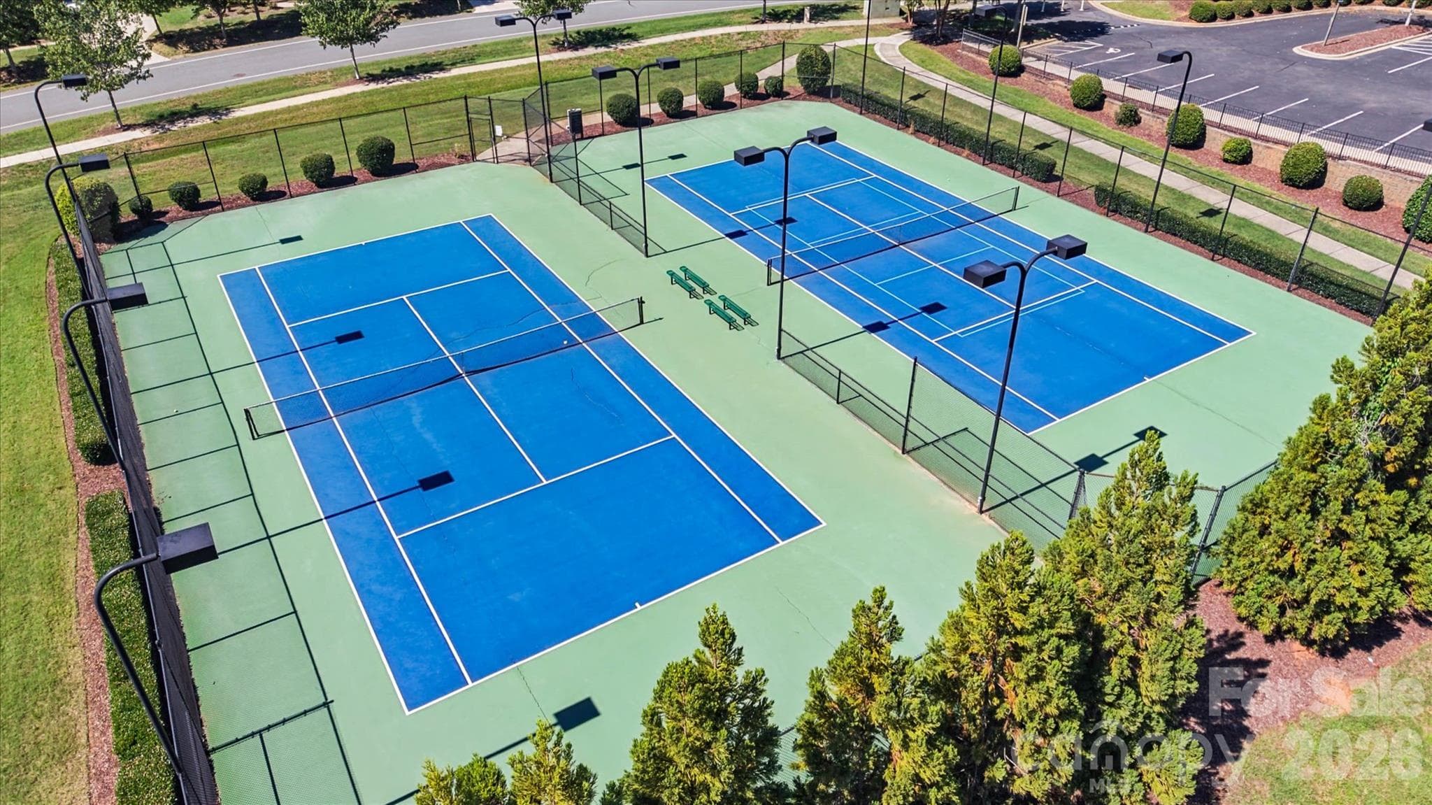 Date nights don't have to mean dinner reservations — two lit courts are waiting right in your neighborhood. - 1216 Glade Arch Lane, Huntersville