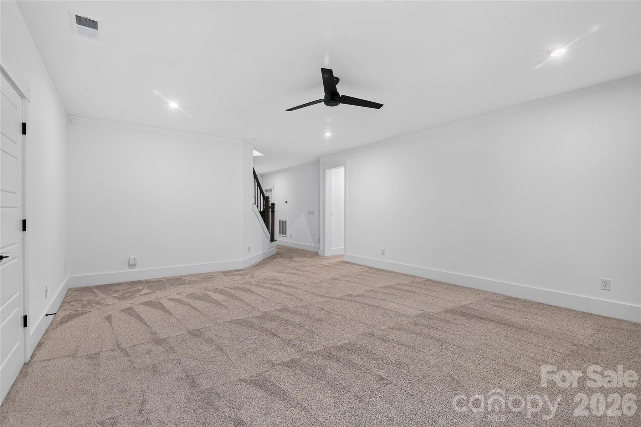Bonus room, game room, teen suite, or home gym, this is not just a basement - 1216 Glade Arch Lane, Huntersville