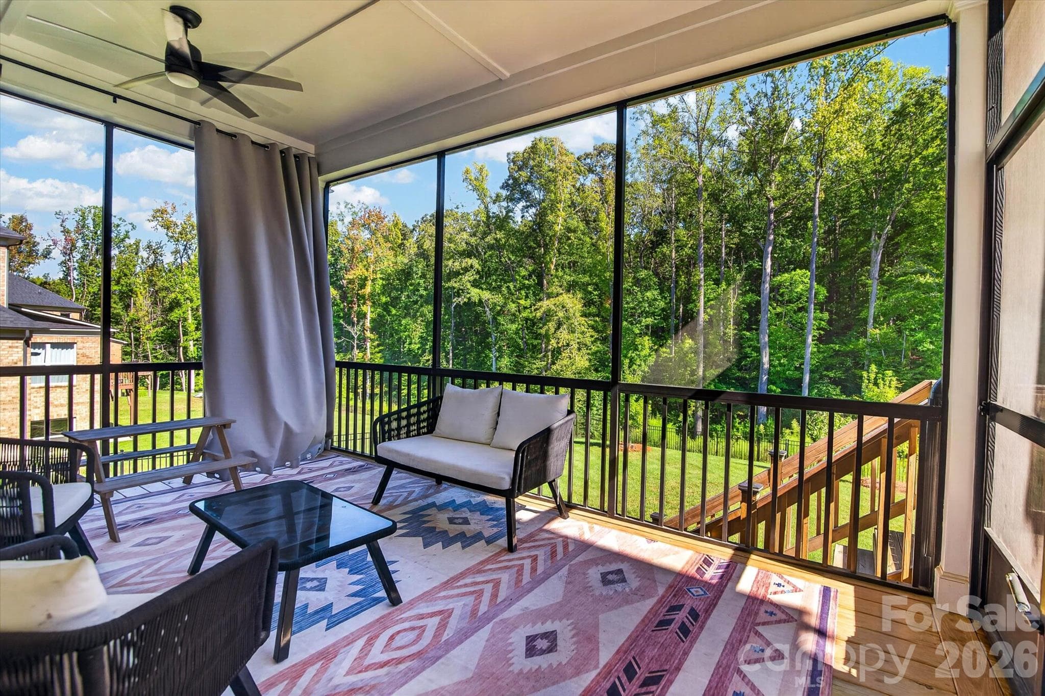 Floor-to-ceiling trees. A ceiling fan and your favorite people. - 1216 Glade Arch Lane, Huntersville