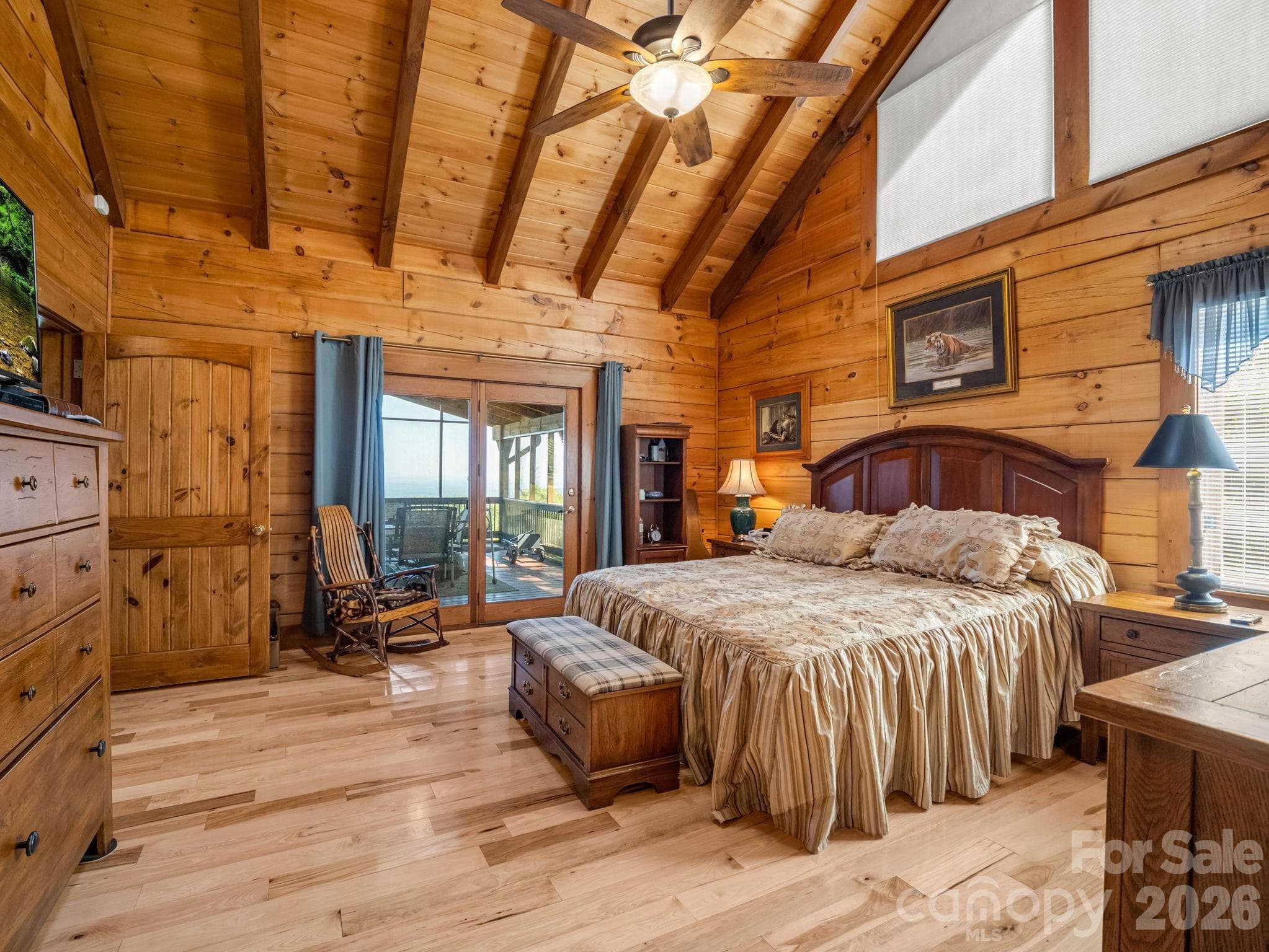 Primary bedroom has maple floors, expansive ceiling and opens to screen porch - 5409 Mineral Springs Mountain Avenue, Valdese