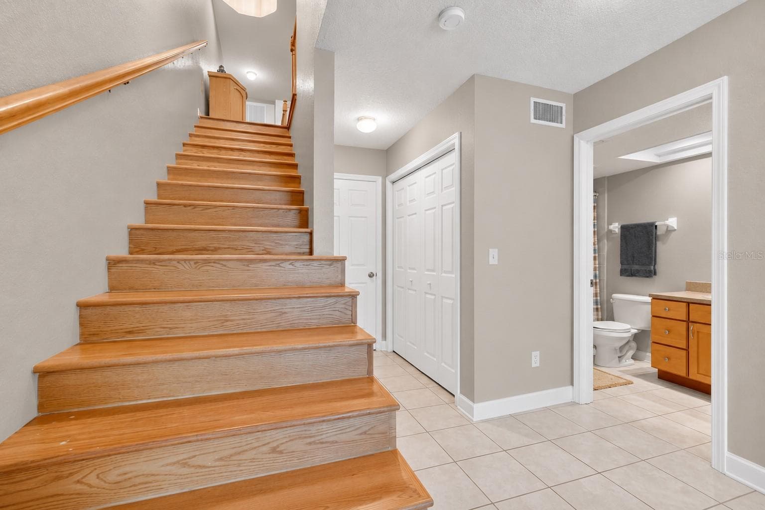 Flexible downstairs bonus room with closet and full bath - 14879 SEMINOLE TRL, SEMINOLE