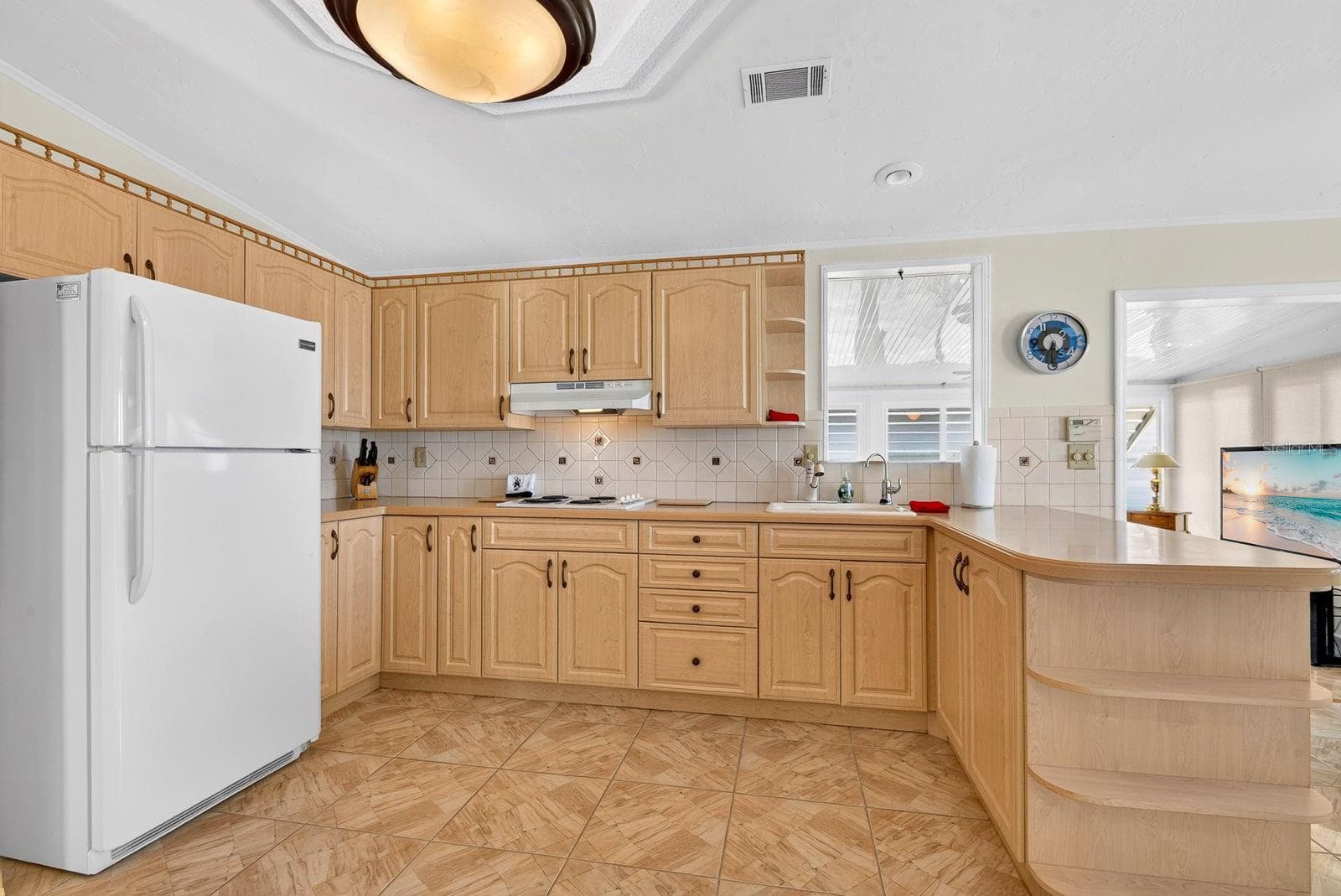 Large kitchen area tons of cabinets - 10315 CORTEZ RD W #7F, BRADENTON
