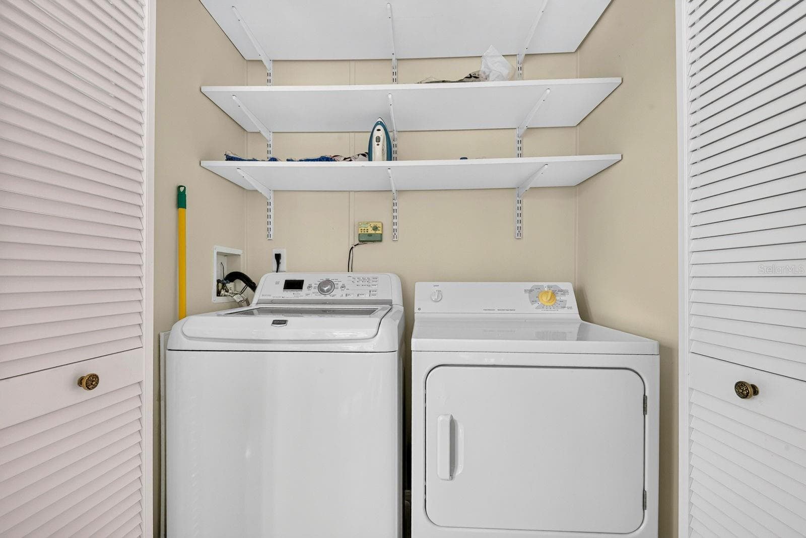 Washer and Dryer closet inside - 10315 CORTEZ RD W #7F, BRADENTON