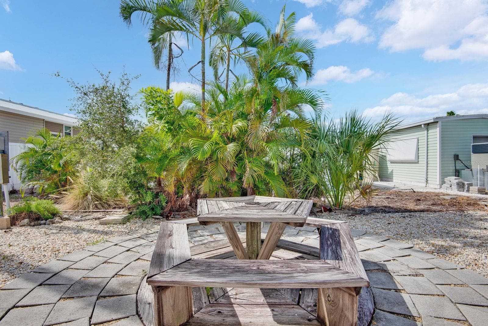Picnic table behind home - 10315 CORTEZ RD W #7F, BRADENTON