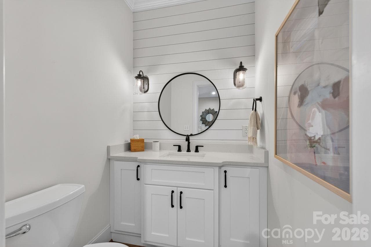 main floor 1/2 bathroom - 148 Forest Lake Court, Mount Gilead