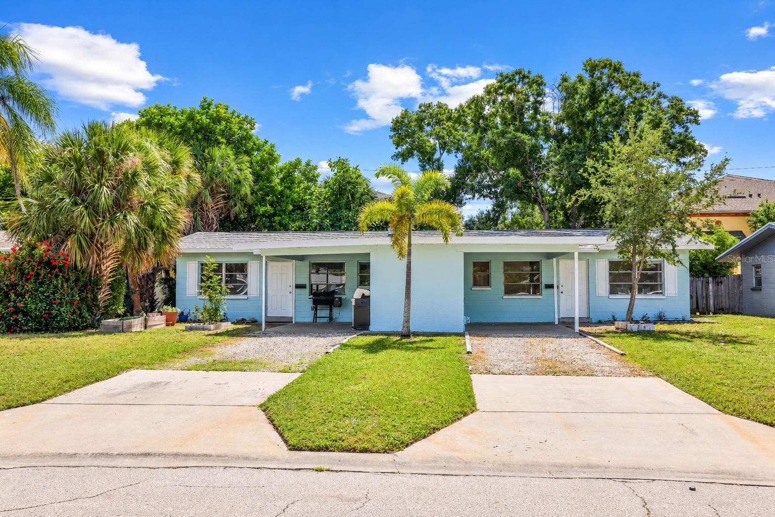 Separate Laundry Rooms are inside middle of building between driveways - 173 38TH AVE SE, ST PETERSBURG