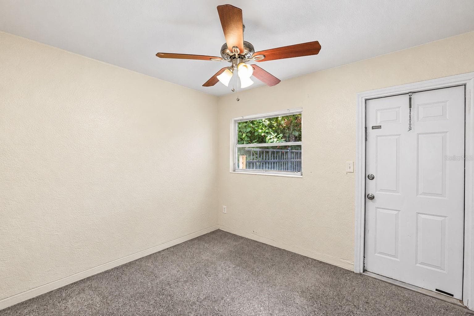 UNit 2 - Bedroom 2 - w Door to Backyard - 173 38TH AVE SE, ST PETERSBURG