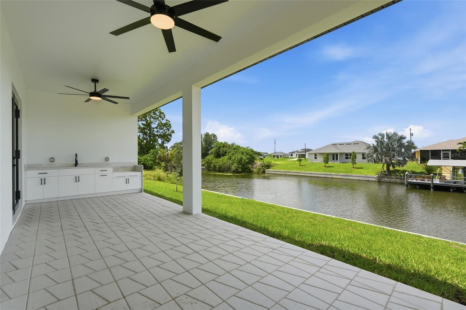 LANAI WITH CANAL VIEW - 227 NE 15TH ST, CAPE CORAL