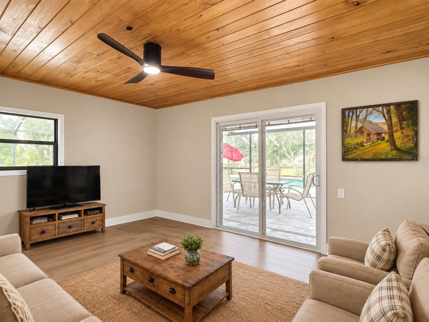 Virtually staged den area off pool area - 216 CORBETT RD, LITHIA