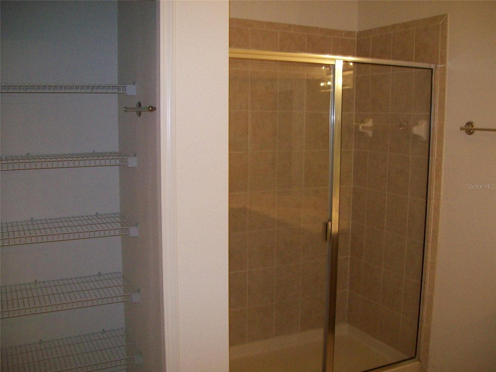 Primary Shower and Linen Closet - 3459 PARKRIDGE CIR #18-103, SARASOTA