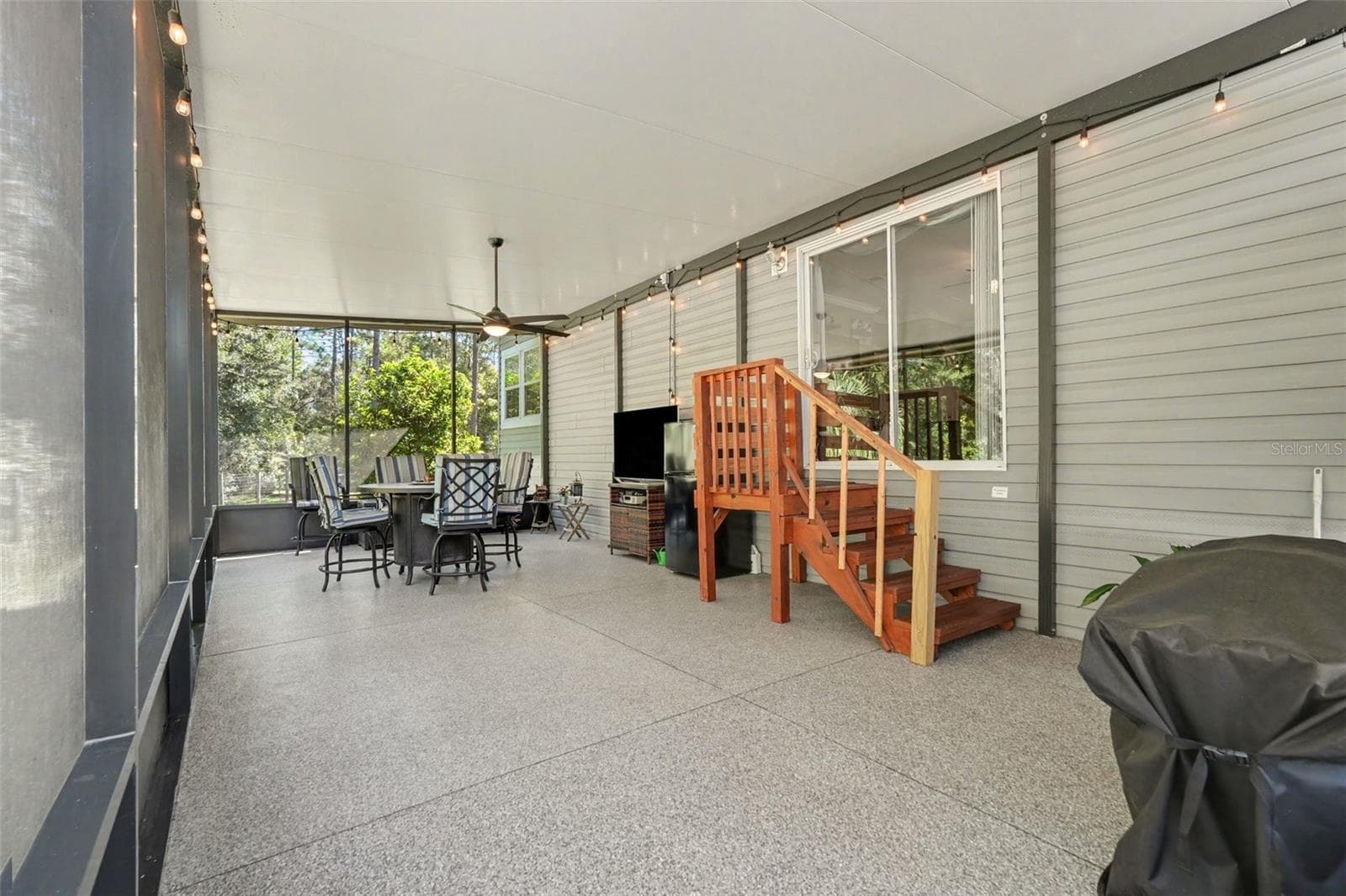 Screened covered patio - 4943 E STAGE COACH TRL, FLORAL CITY