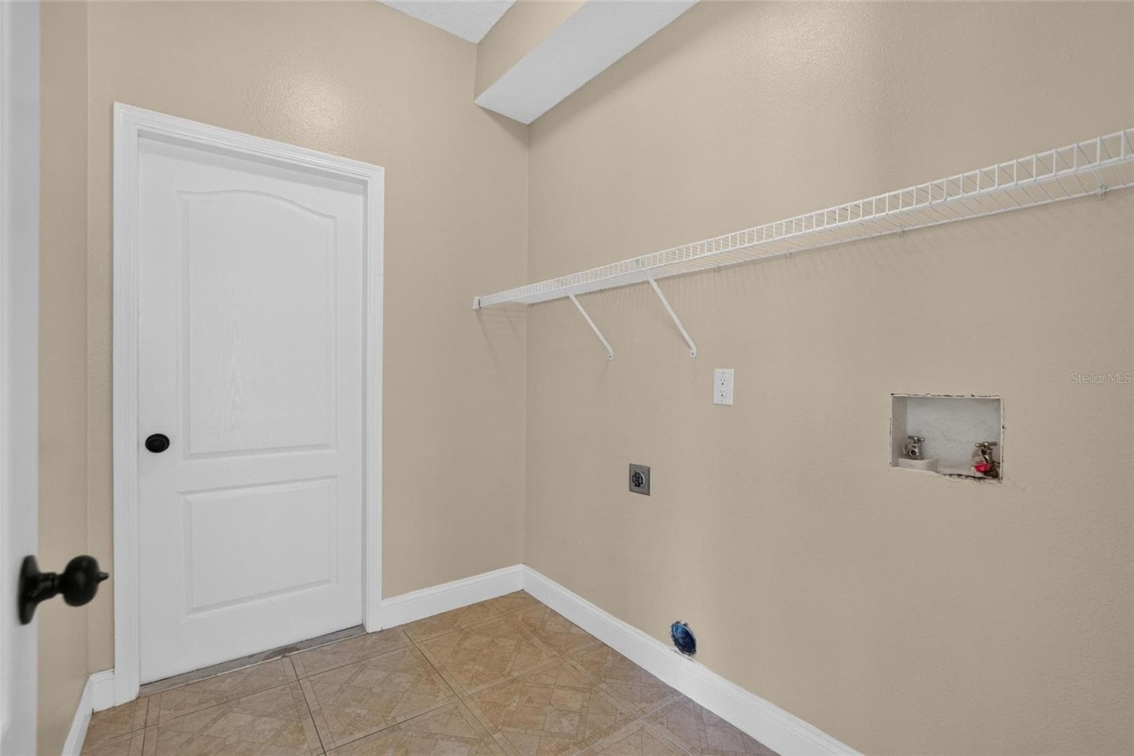 downstairs laundry - 9110 ROCKROSE DR, TAMPA
