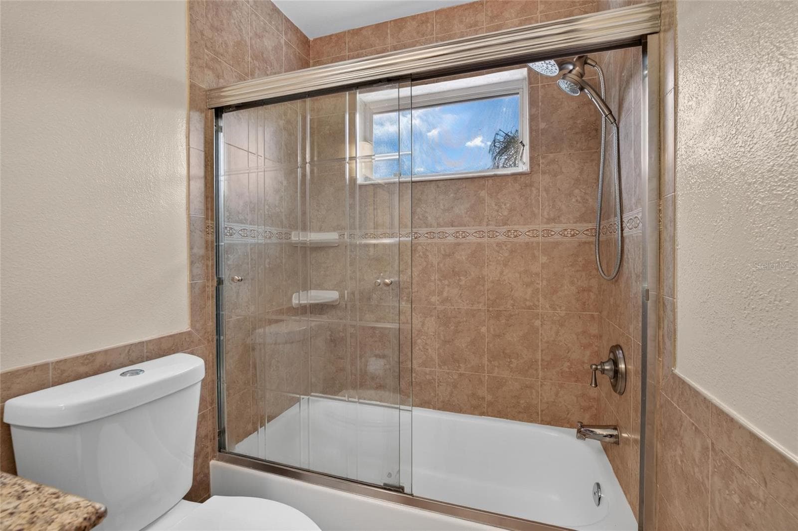 upstairs bathroom - 9110 ROCKROSE DR, TAMPA