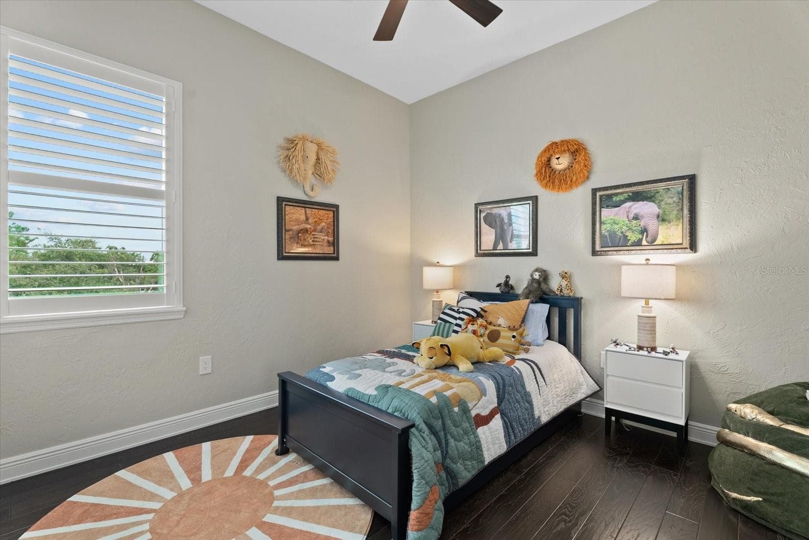 Bedroom four is a cosy space, with hardwood floors, built-in closet and access to the Jack and Jill bathroom - 520 RYE RD NE, BRADENTON