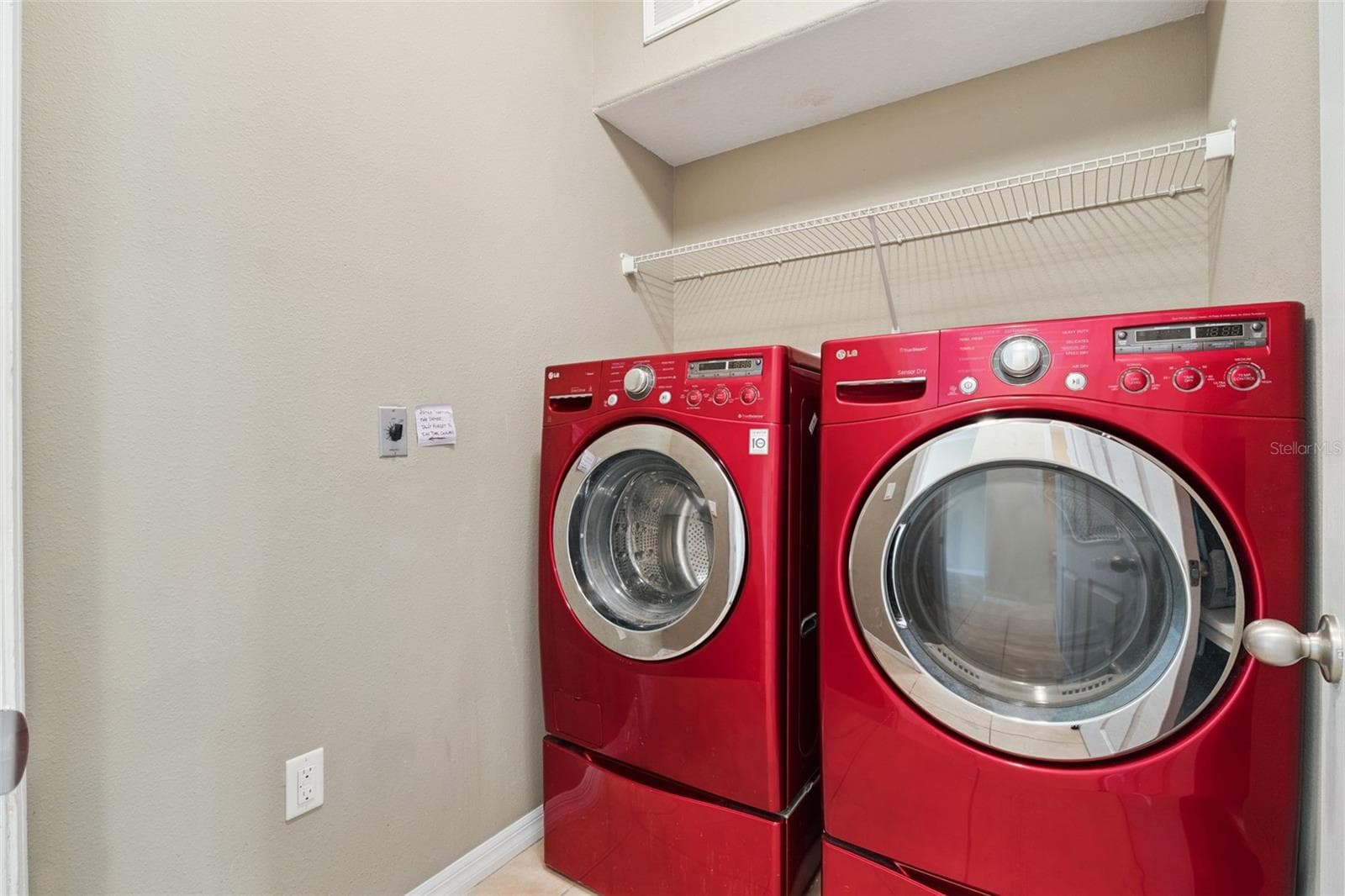 Laundry Room with Shelving on Main Floor - 1436 WINTER WHARF LN, WINTER SPRINGS