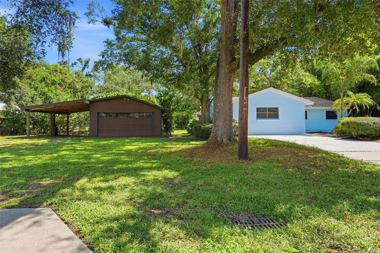 All on a Double 0.37 Acre Lot: 5 Bedroom, 3 Bath *POOL HOME* with a detached 2-Car Garage and added Carport. - 1721 DORCHESTER RD, CLEARWATER