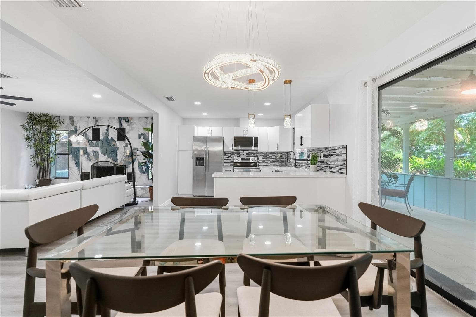 Spacious Dining Area adjacent to Large Sliders, Lanai, and Lush Landscaping. - 1721 DORCHESTER RD, CLEARWATER