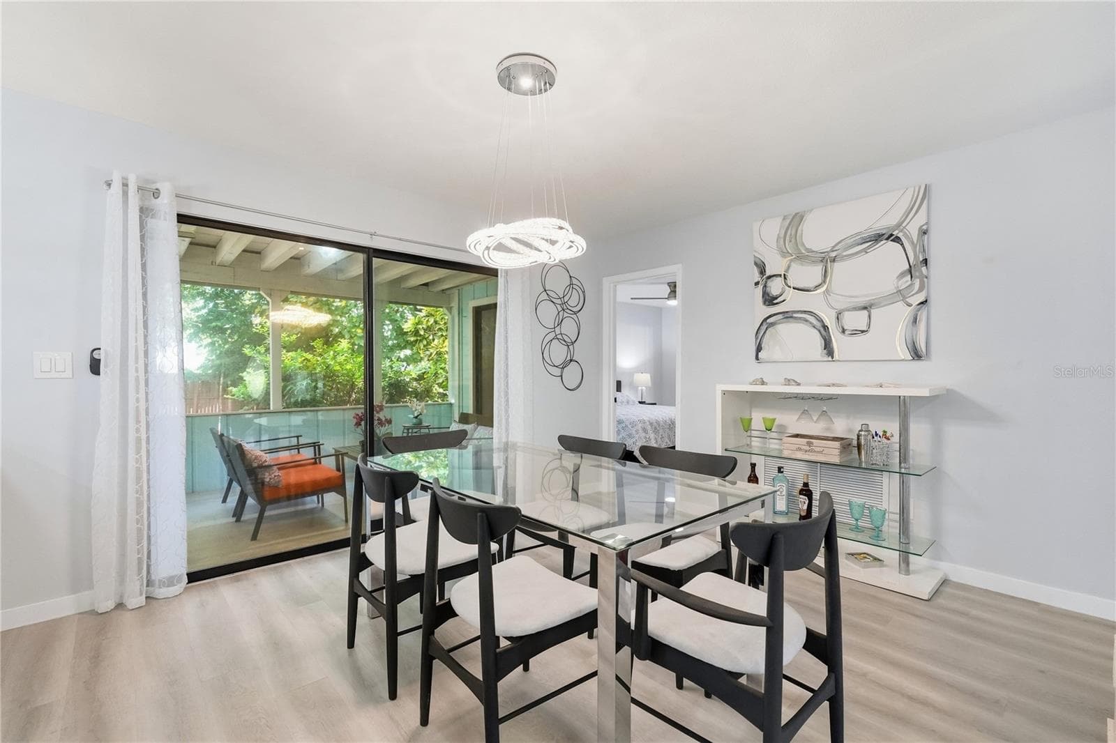 Spacious Dining Area adjacent to Large Sliders, Lanai, and Lush Landscaping. - 1721 DORCHESTER RD, CLEARWATER