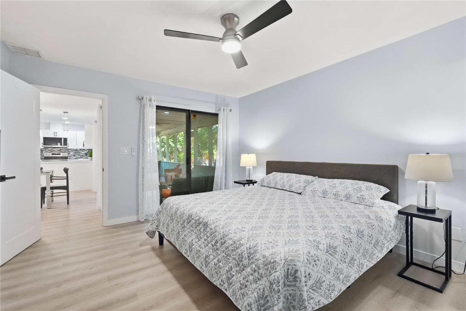 Primary Bedroom has a Slider to the Lanai. - 1721 DORCHESTER RD, CLEARWATER