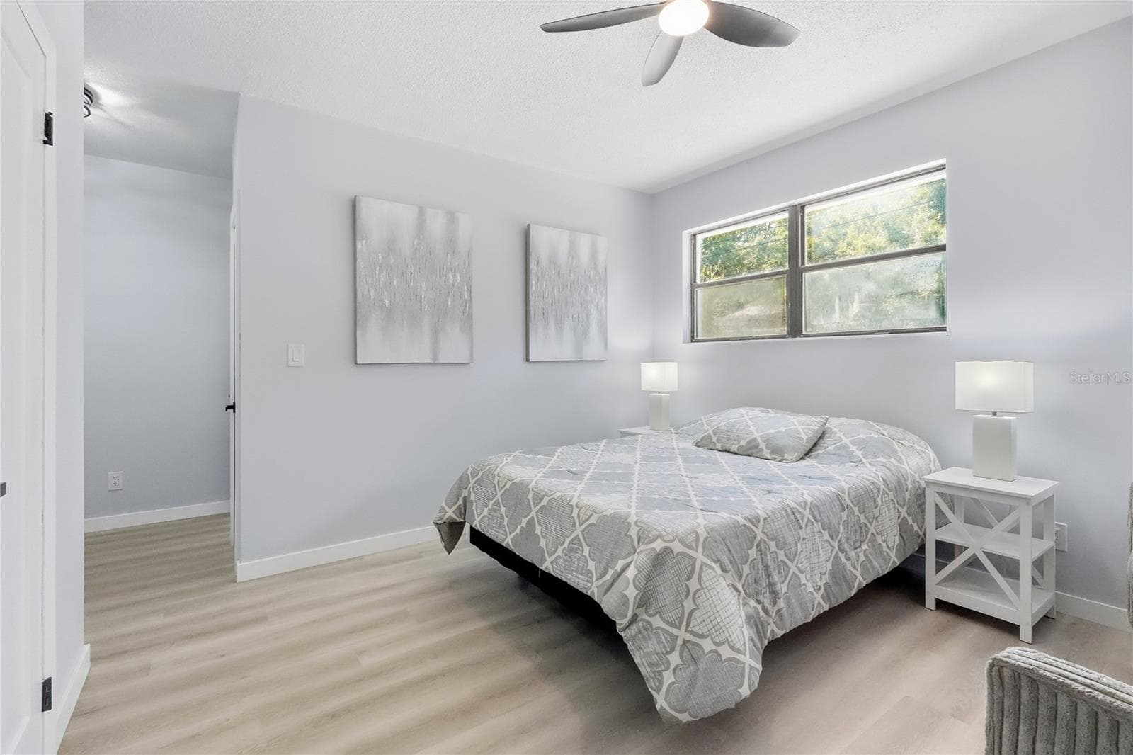 In-Law Suite - easily mount a TV on this wall showing art. - 1721 DORCHESTER RD, CLEARWATER