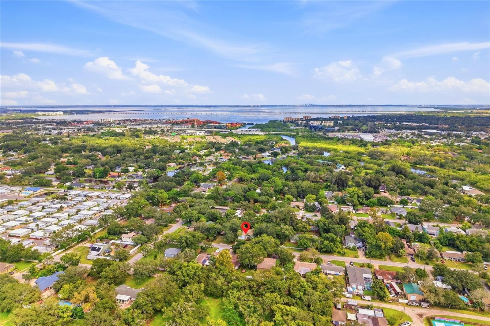 Located 22-minute drive to Clearwater Beach AND only a 14 minute drive to the beach at Courtney Campbell Causeway. - 1721 DORCHESTER RD, CLEARWATER