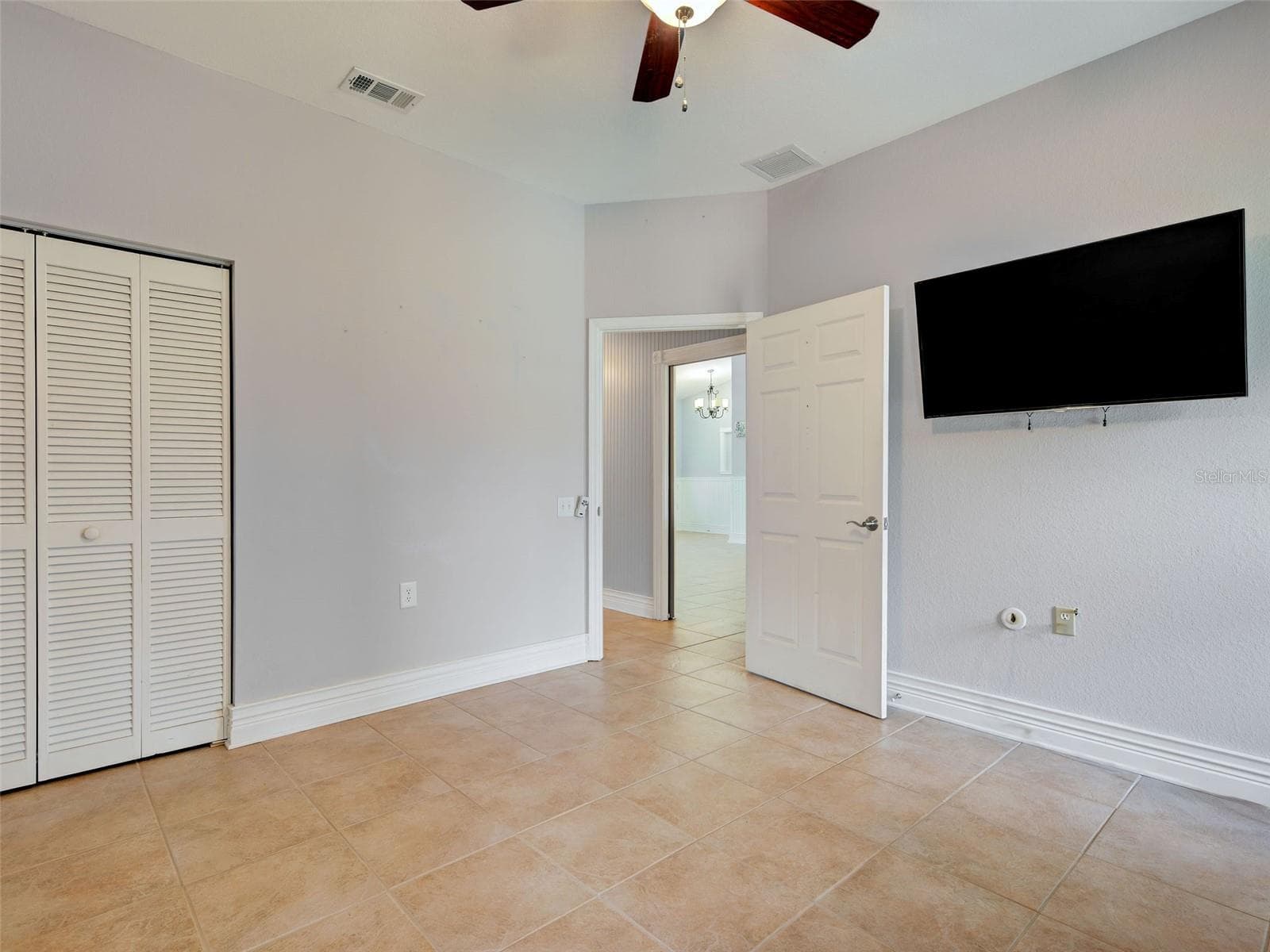 Second guest bedroom has a built in closet. - 23102 MADELYN AVE, PORT CHARLOTTE