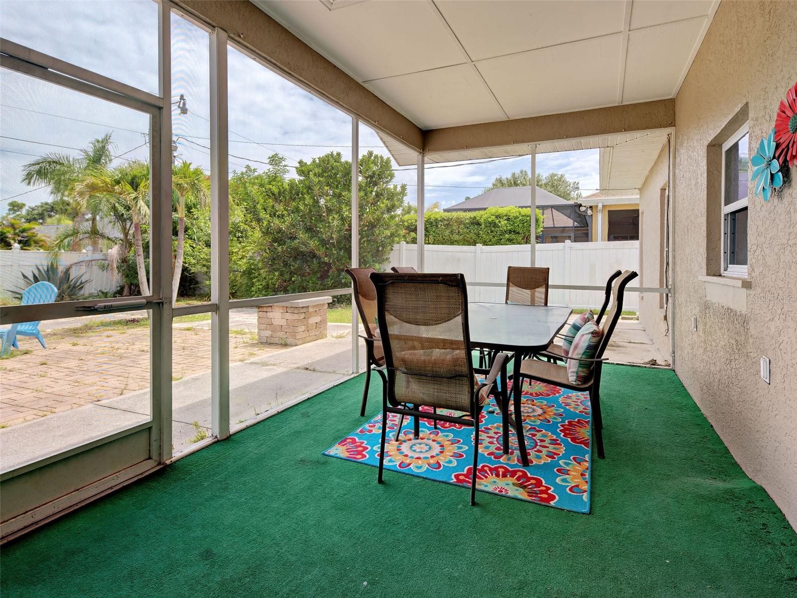 Room for a table and chairs in the lanai to create an outdoor dining room. - 23102 MADELYN AVE, PORT CHARLOTTE