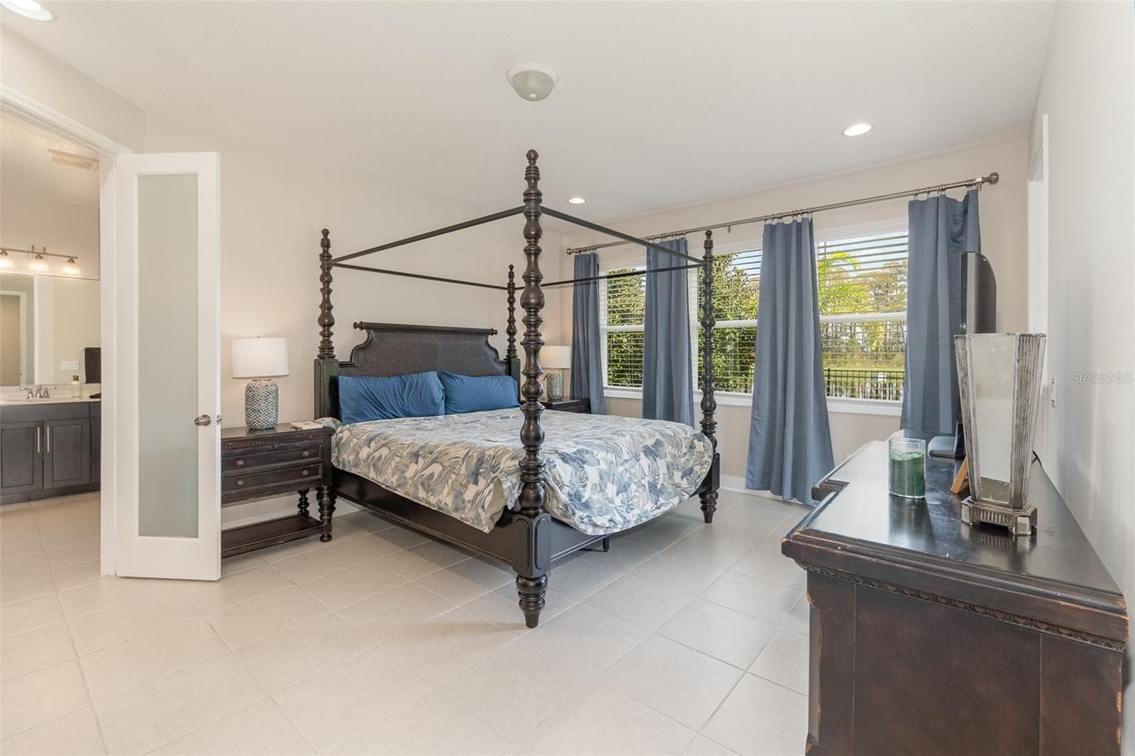 Primary Bedroom with door to lanai - 13557 PARKFIELD WAY, WINTER GARDEN