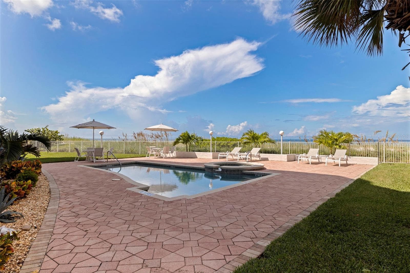 Pool and pation area - 19616 GULF BLVD #302, INDIAN SHORES