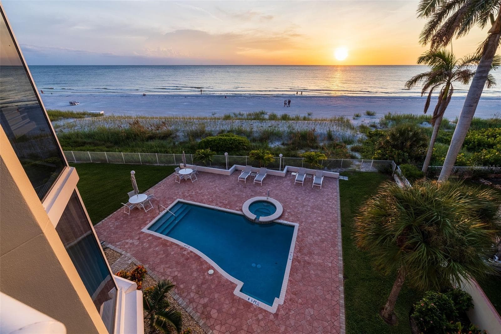 Poolside sunsets - 19616 GULF BLVD #302, INDIAN SHORES