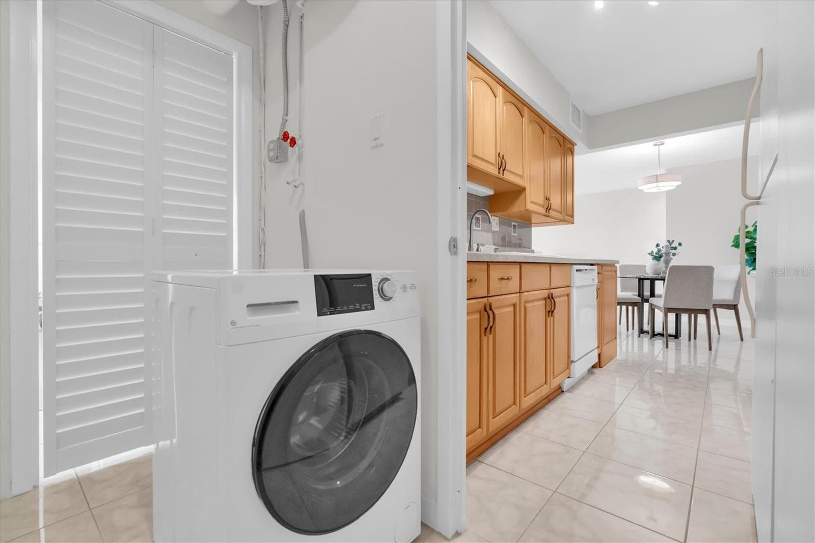 Utility Room w/Washer/Dryer Combo - 10355 PARADISE BLVD #208, TREASURE ISLAND