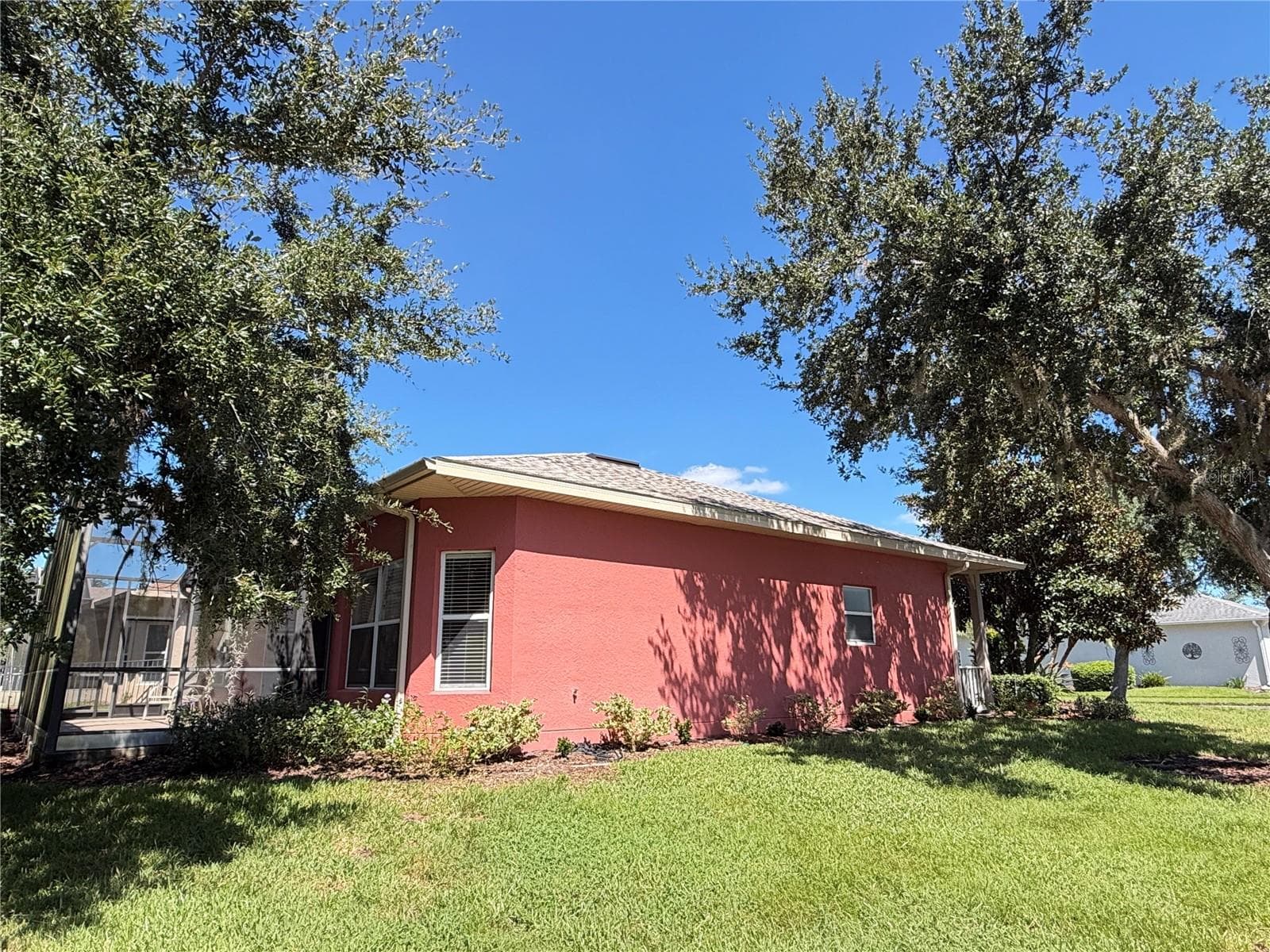 Side Yard - 219 KNOLL WOOD DR, POINCIANA