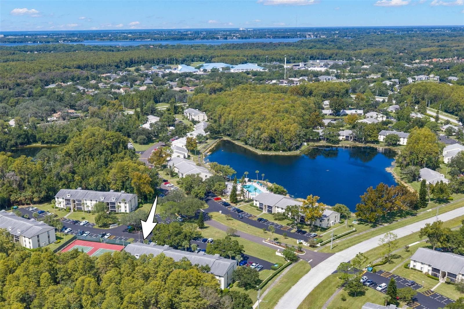 This wider view puts the location in perspective: preserve acreage, community lakes, and amenities surround the condo, while Tampa, Gulf beaches, and Lake Tarpon recreation are all within easy reach. - 3188 LAKE PINE WAY S #F1, TARPON SPRINGS