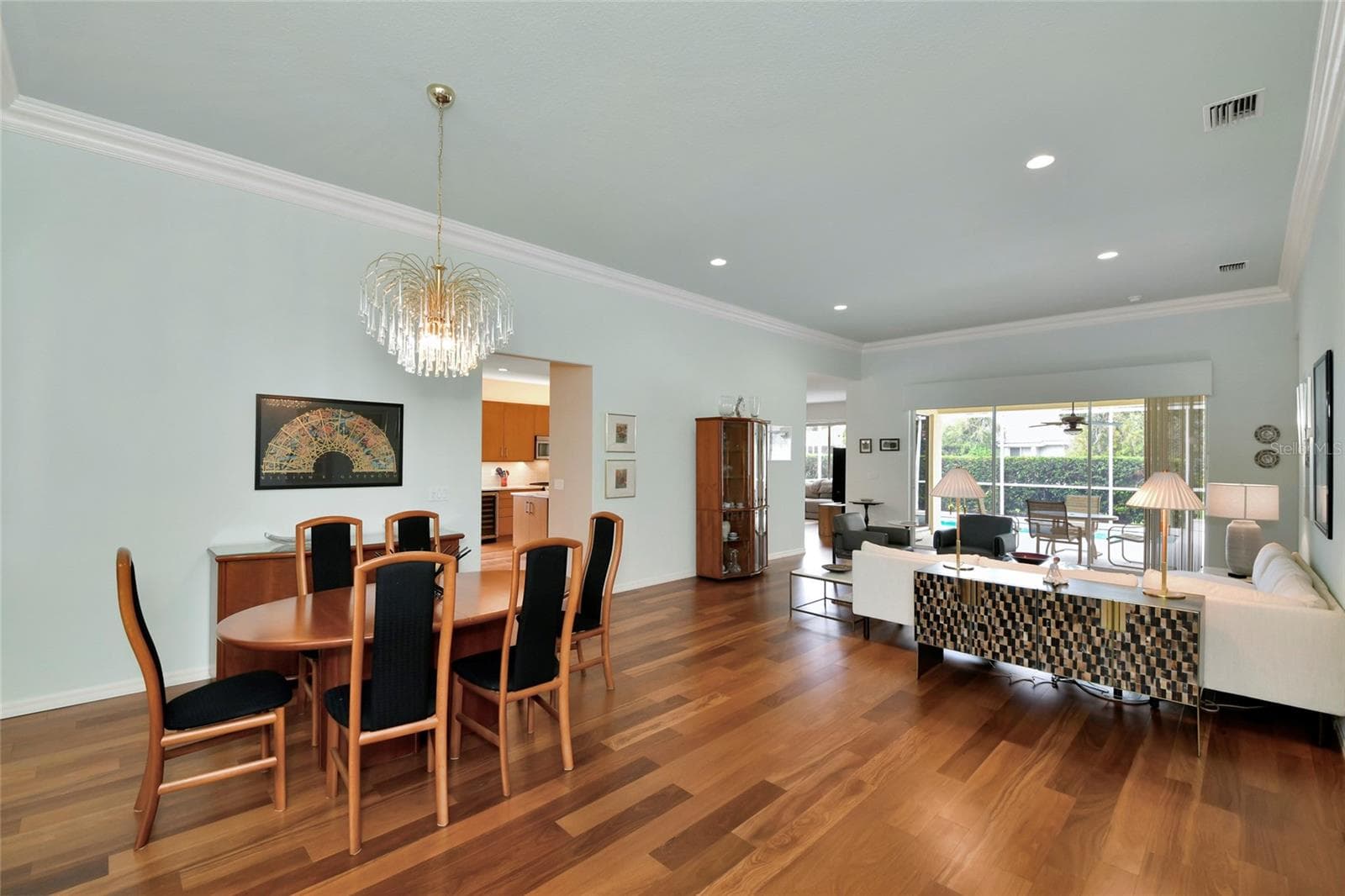 Brazilian wide plank teak floors in all active living areas. - 6256 DONNINGTON CT, SARASOTA