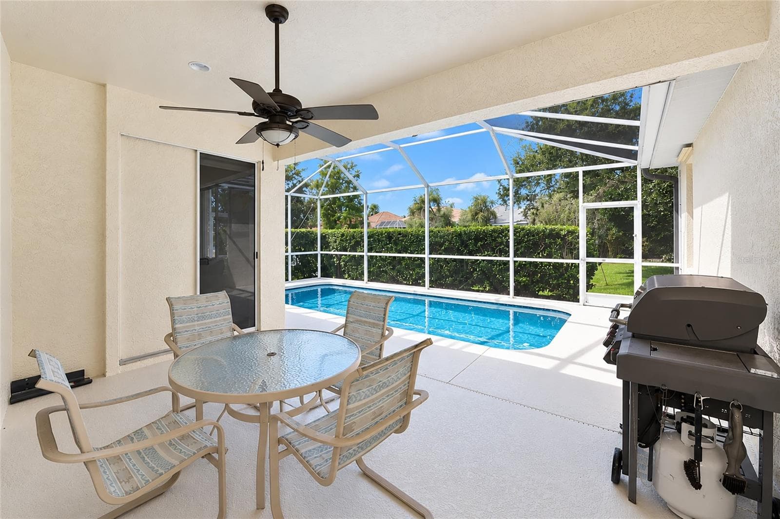 Covered lanai 17.5'x10.75' off family room and living room sliding doors - 6256 DONNINGTON CT, SARASOTA