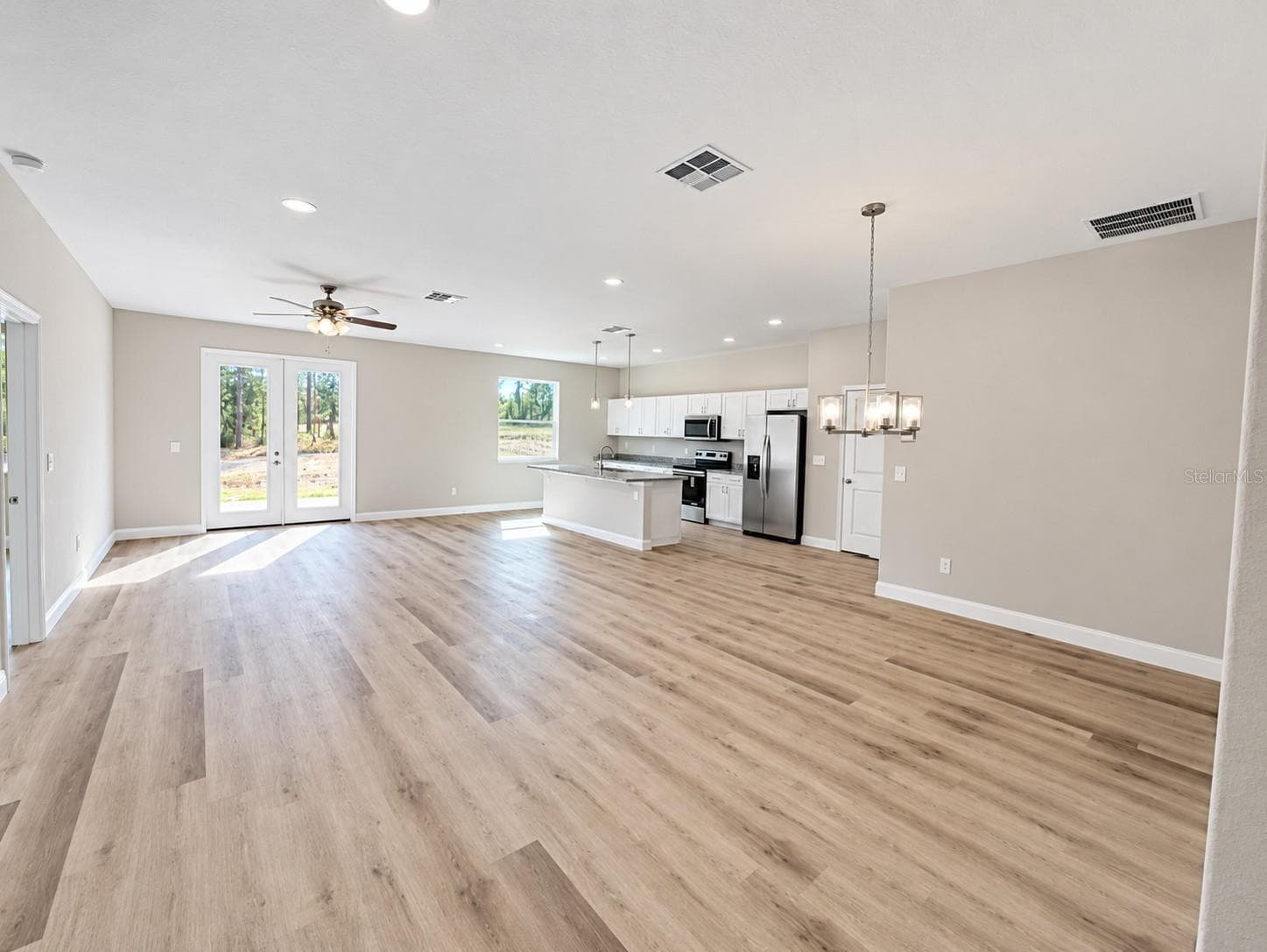 Great room model facing 8' French Doors model - 21521 SW MARINE BLVD, DUNNELLON