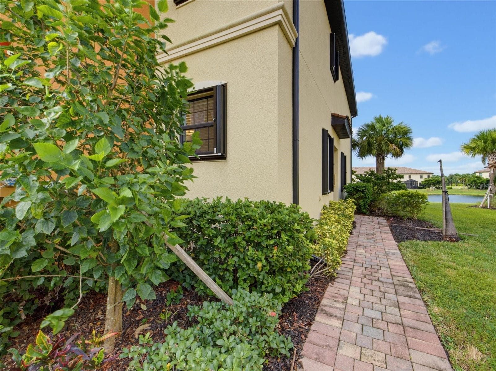 Pavered sidewalk to entrance - 20429 LAGENTE CIR, VENICE