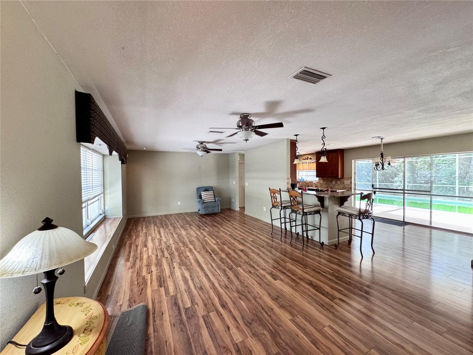 Living room open to kitchen/dining area - 22215 ONEIDA AVE, PORT CHARLOTTE