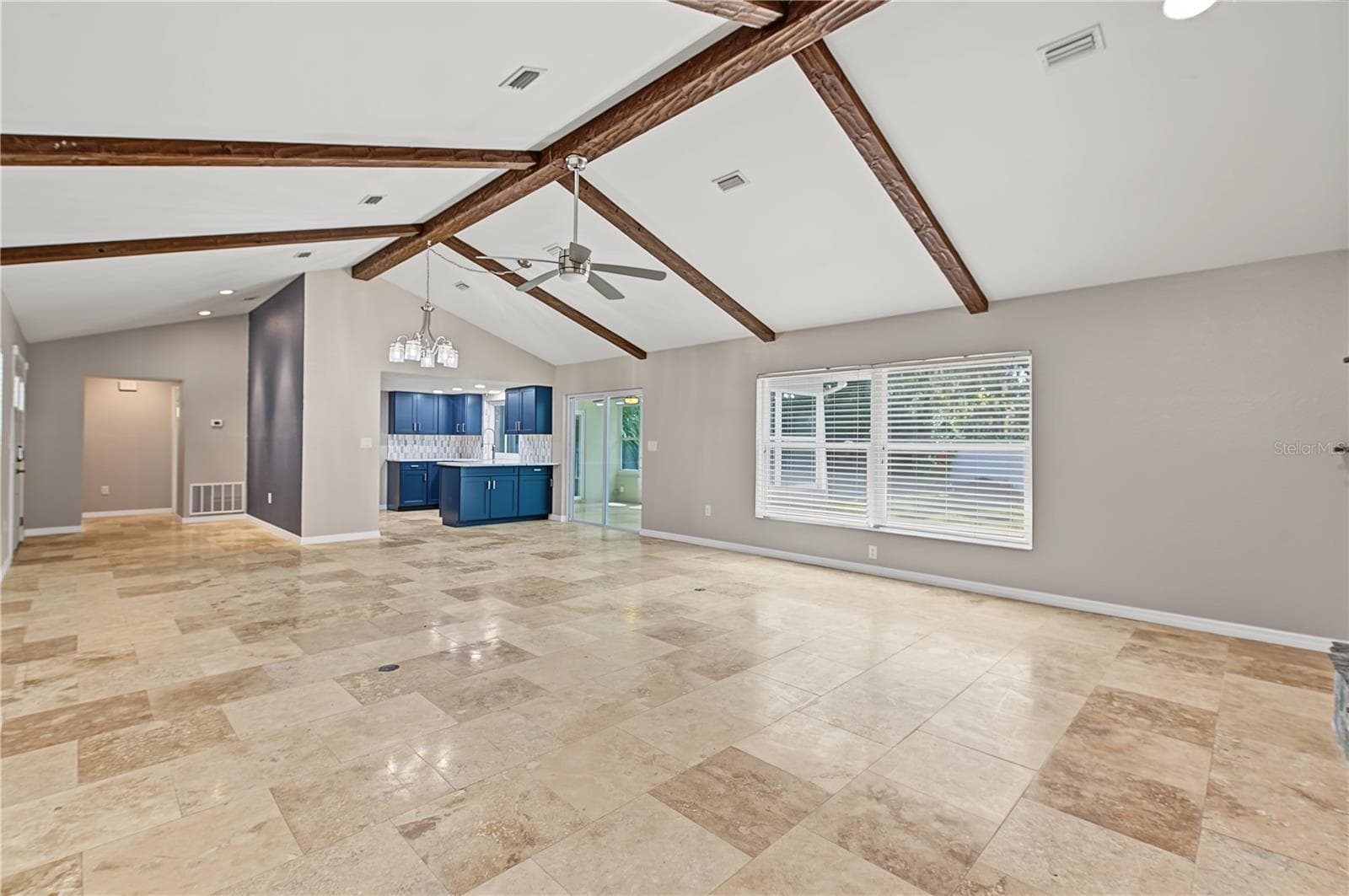Stunning architectural details include exposed wood beams, vaulted ceilings, and an abundance of natural light. - 260 SE 16TH TER, CRYSTAL RIVER