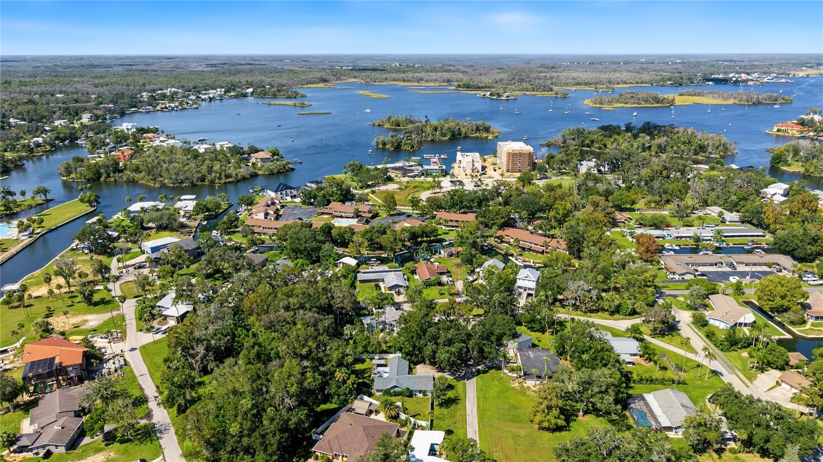 Sweeping aerial perspective showcasing Crystal River's scenic waterways and surrounding residential landscape. - 260 SE 16TH TER, CRYSTAL RIVER