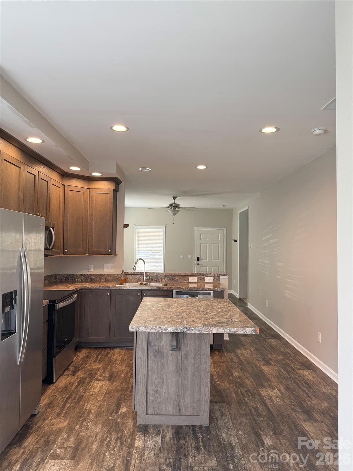 open floorpan looking from breakfast nook to the living room. - 323 Martin Street, Shelby